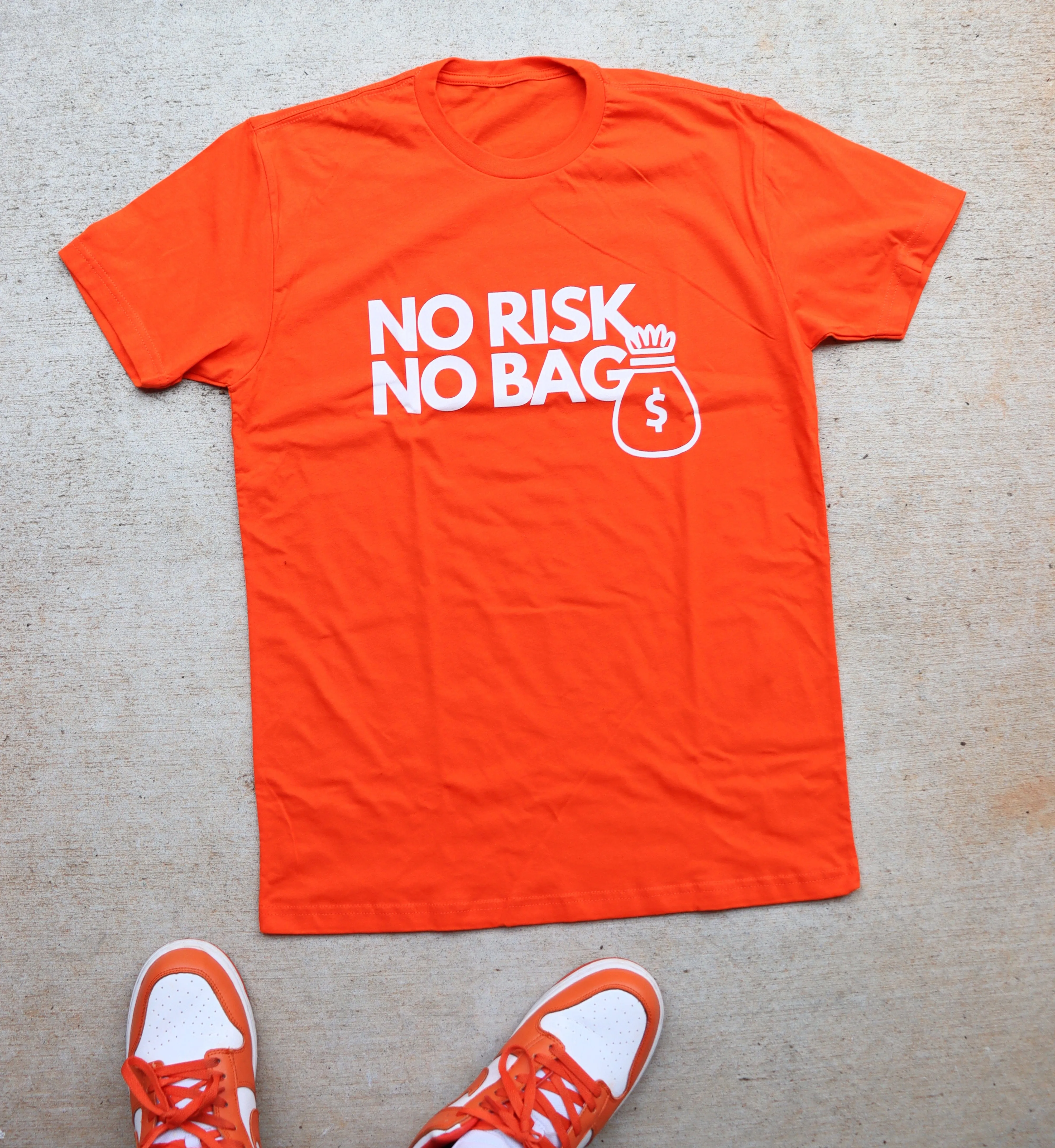 RISKY REWARDS “NO RISK NO BAG” COTTON ORANGE TEE
