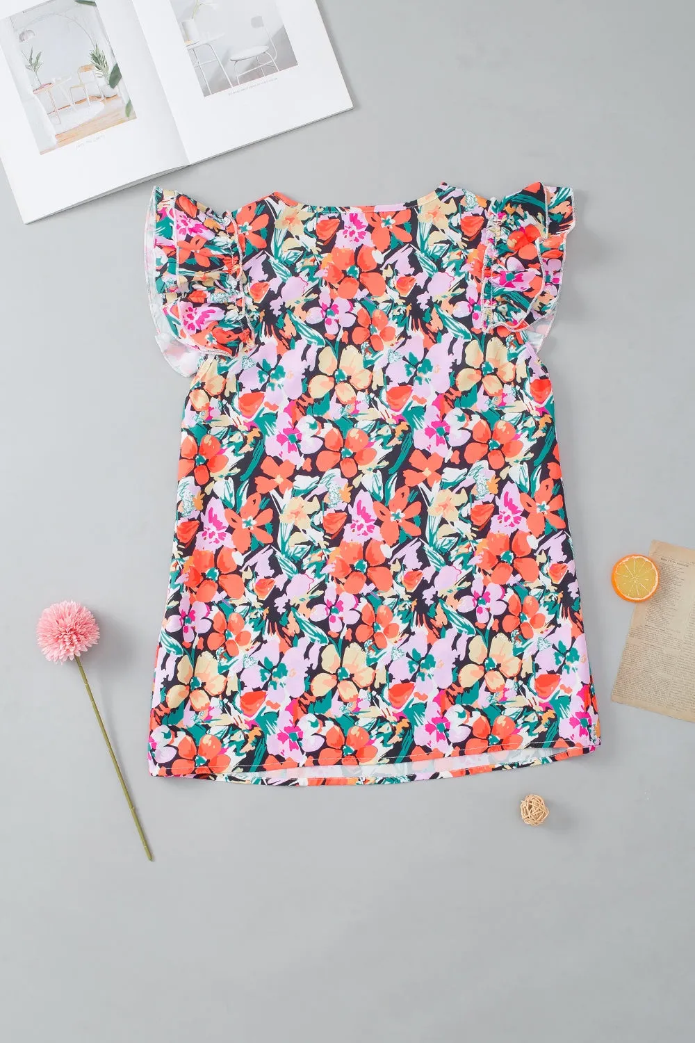 Ruffled Printed V-Neck Cap Sleeve Blouse
